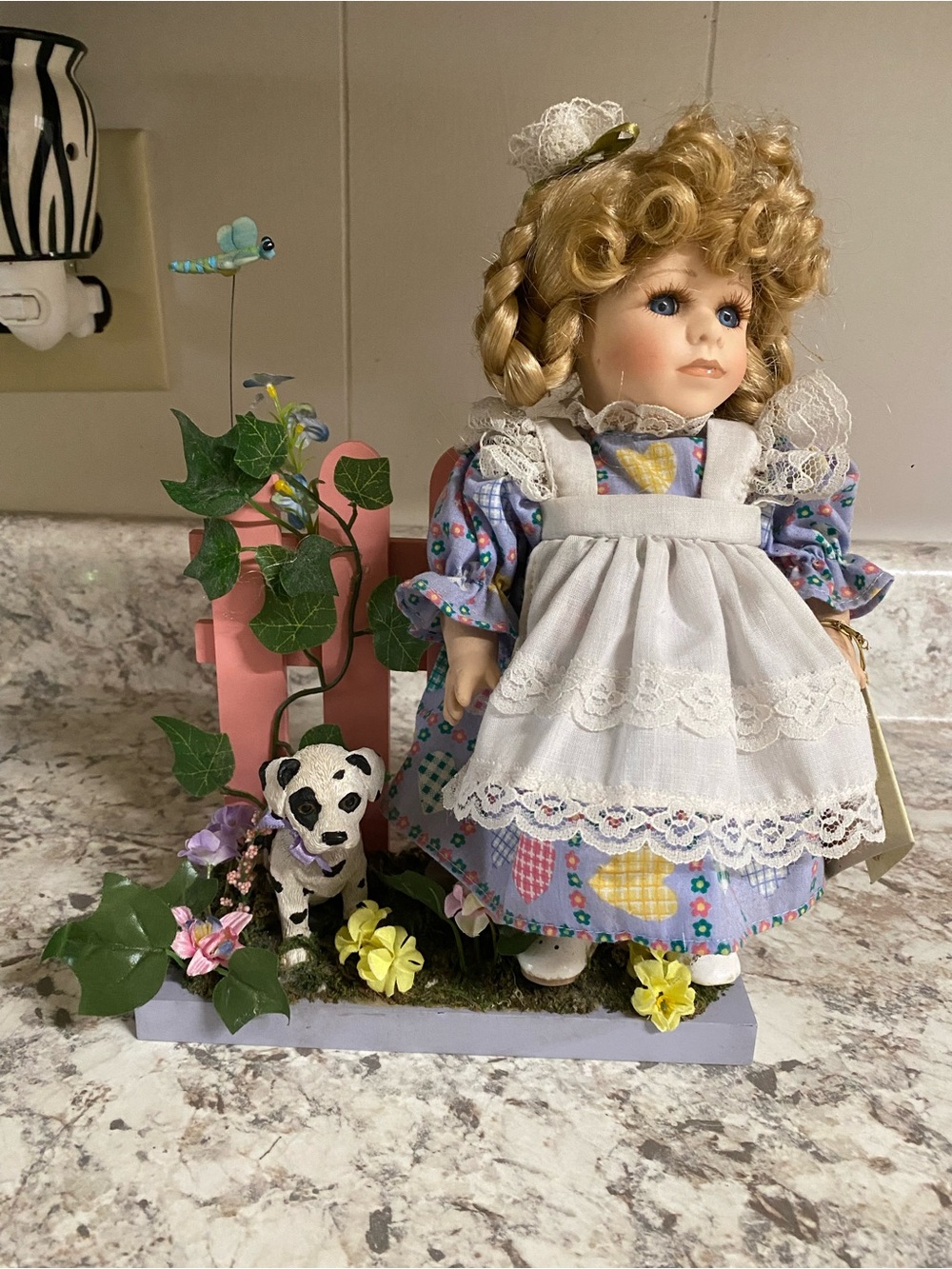Porcelain Blonde Curly-Hair Doll with Apron and Floral Dress
